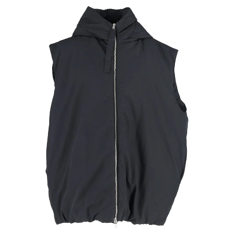 Lightweight men jackets made from recycled nylon for eco - friendly travel Men coats with a contrasting trim for a fashion - forward aesthetic Jil Sander Hooded Down Vest in Black Recycled Polyester Lightweight men jackets made from recycled nylon for eco - friendly travel Men coats with a contrasting trim for a fashion - forward aesthetic Jil Sander Hooded Down Vest in Black Recycled Polyester