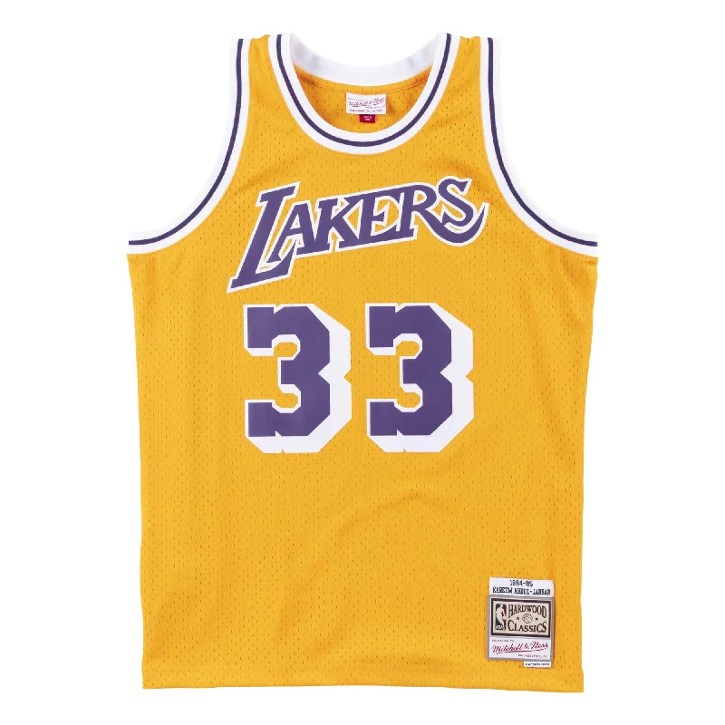 Men's Basketball Jerseys in Sleeveless Design for Enhanced Mobility on the Court LAKERS KAREEM 84 SWINGMAN JERSEY Men's Basketball Jerseys in Sleeveless Design for Enhanced Mobility on the Court LAKERS KAREEM 84 SWINGMAN JERSEY